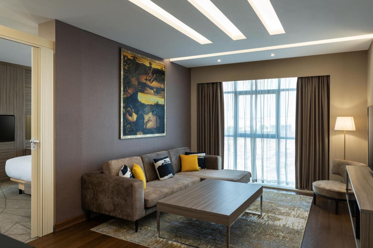 Four Points By Sheraton Production City, Дубай Экстерьер фото