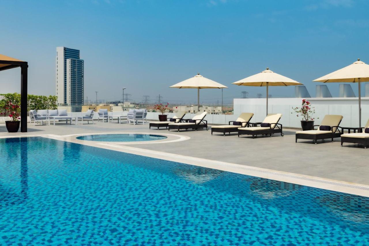 Four Points By Sheraton Production City, Дубай Экстерьер фото